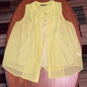 Bright color. Button up Blouse/cami underneath.